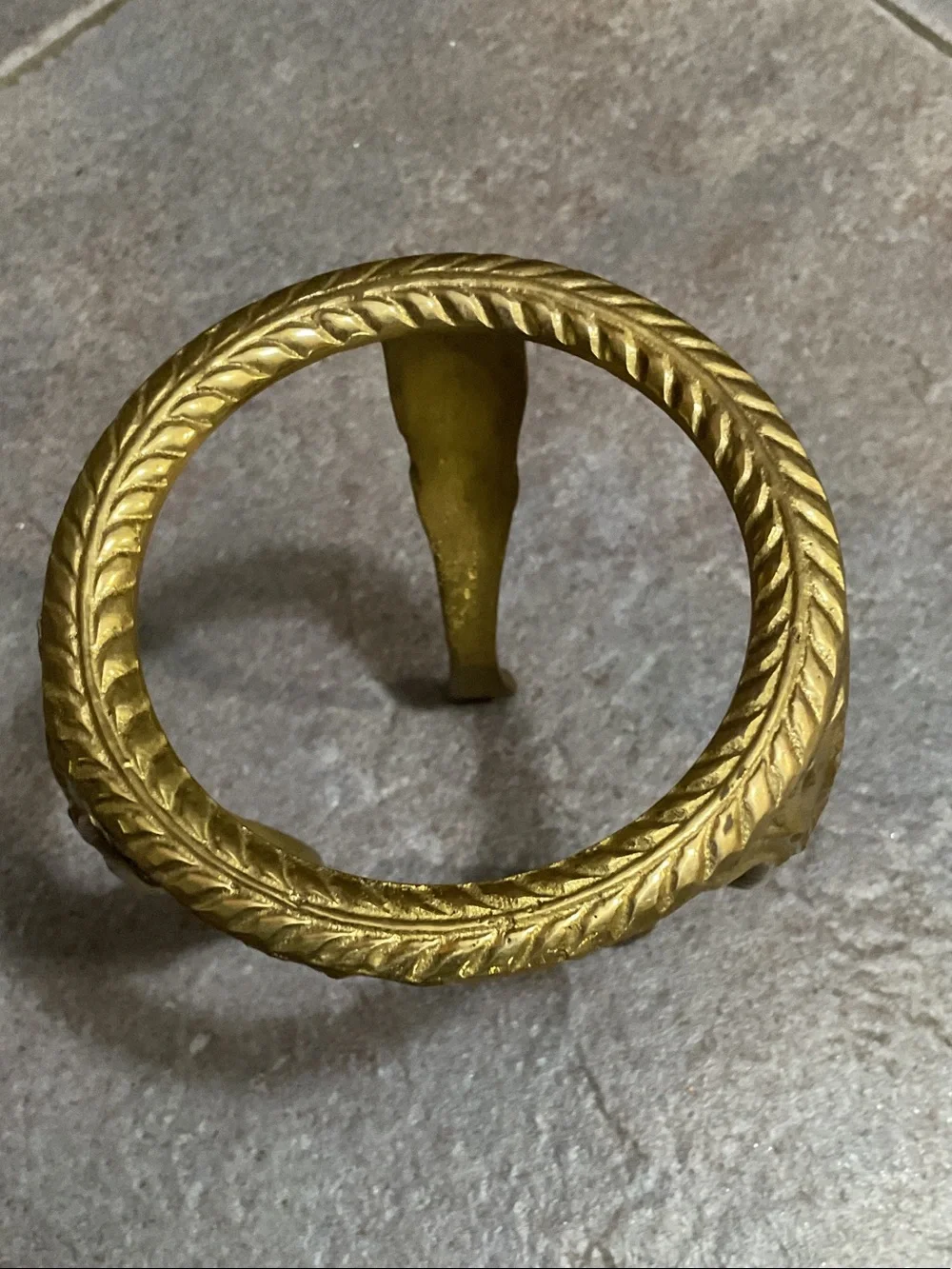Brass candle holder with glass